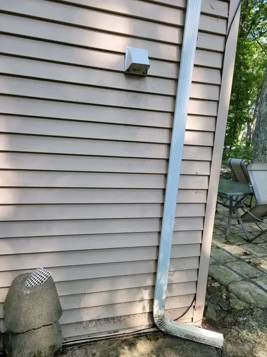 Top-down view of a clean composite deck after power washing service